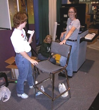 Tammy, Marie, and Nicky Prepare the Booth